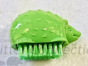 Green hedgie brush